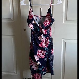 A body con spaghetti strap dress